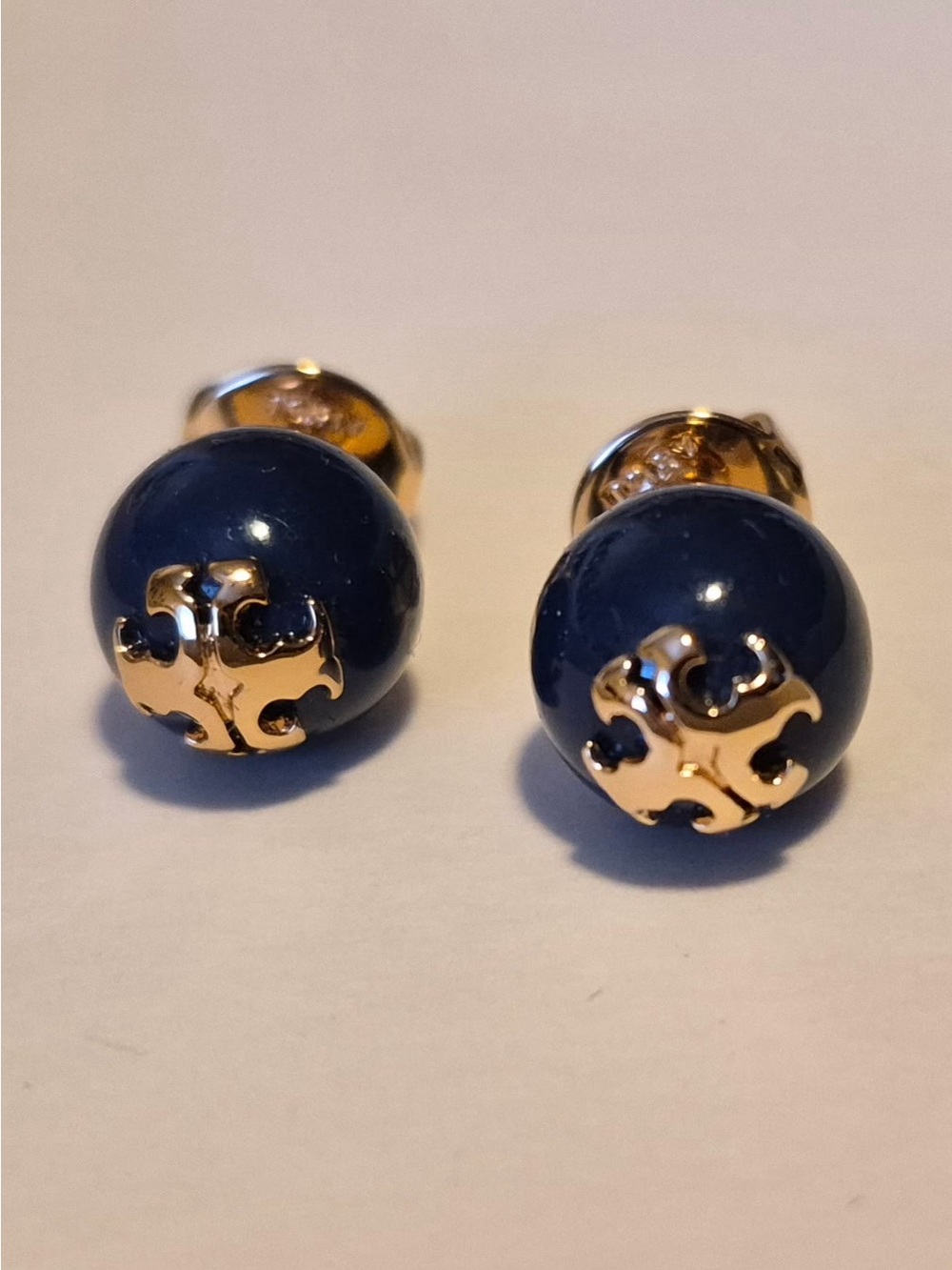 Tory Burch Navy Resin Logo Stud Earrings with Gold Tone Emblem